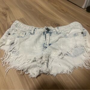 Distressed denim shorts